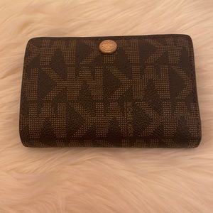 Small brown  MK snap wallet.